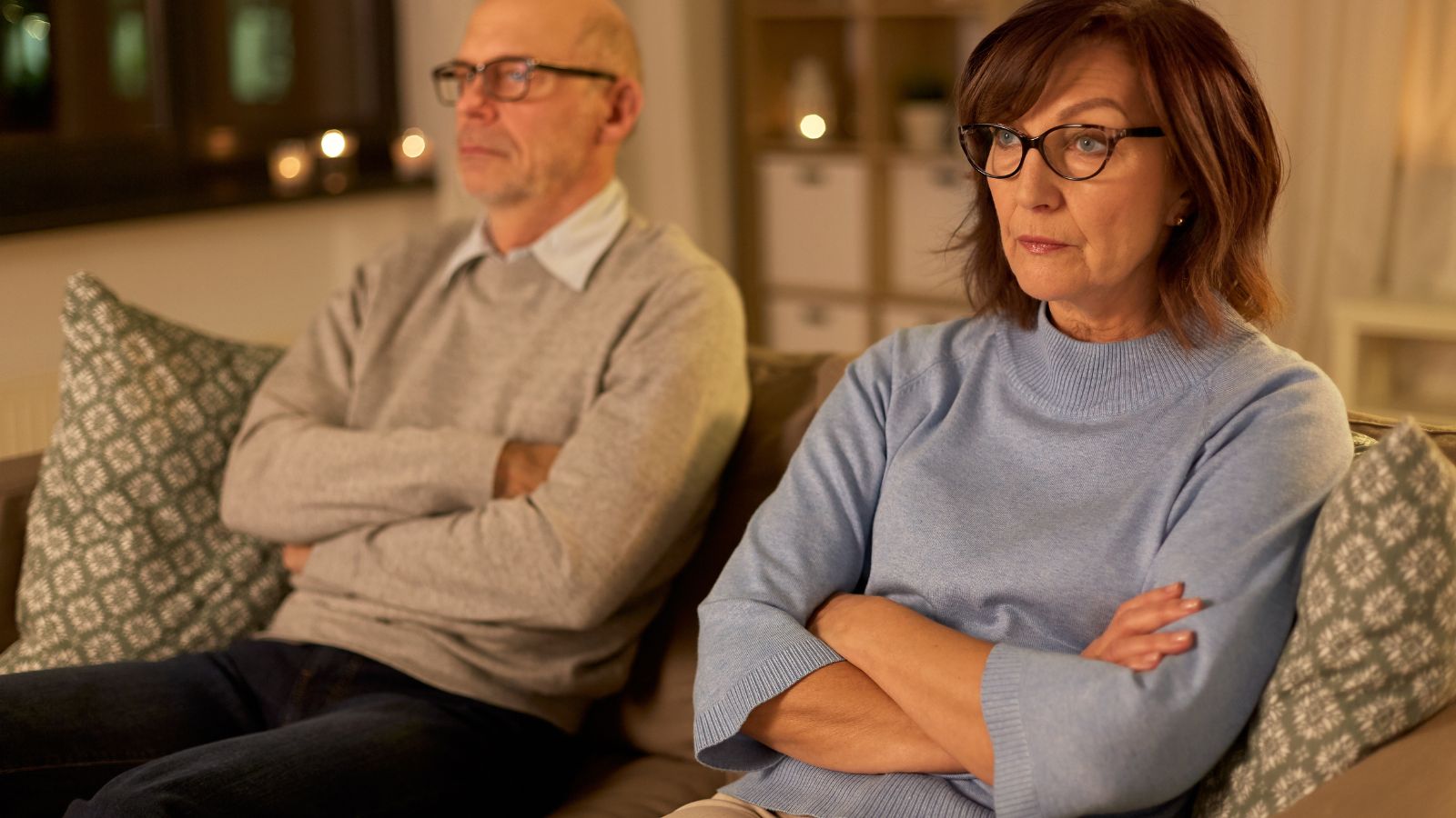 Unhappy couple on the couch